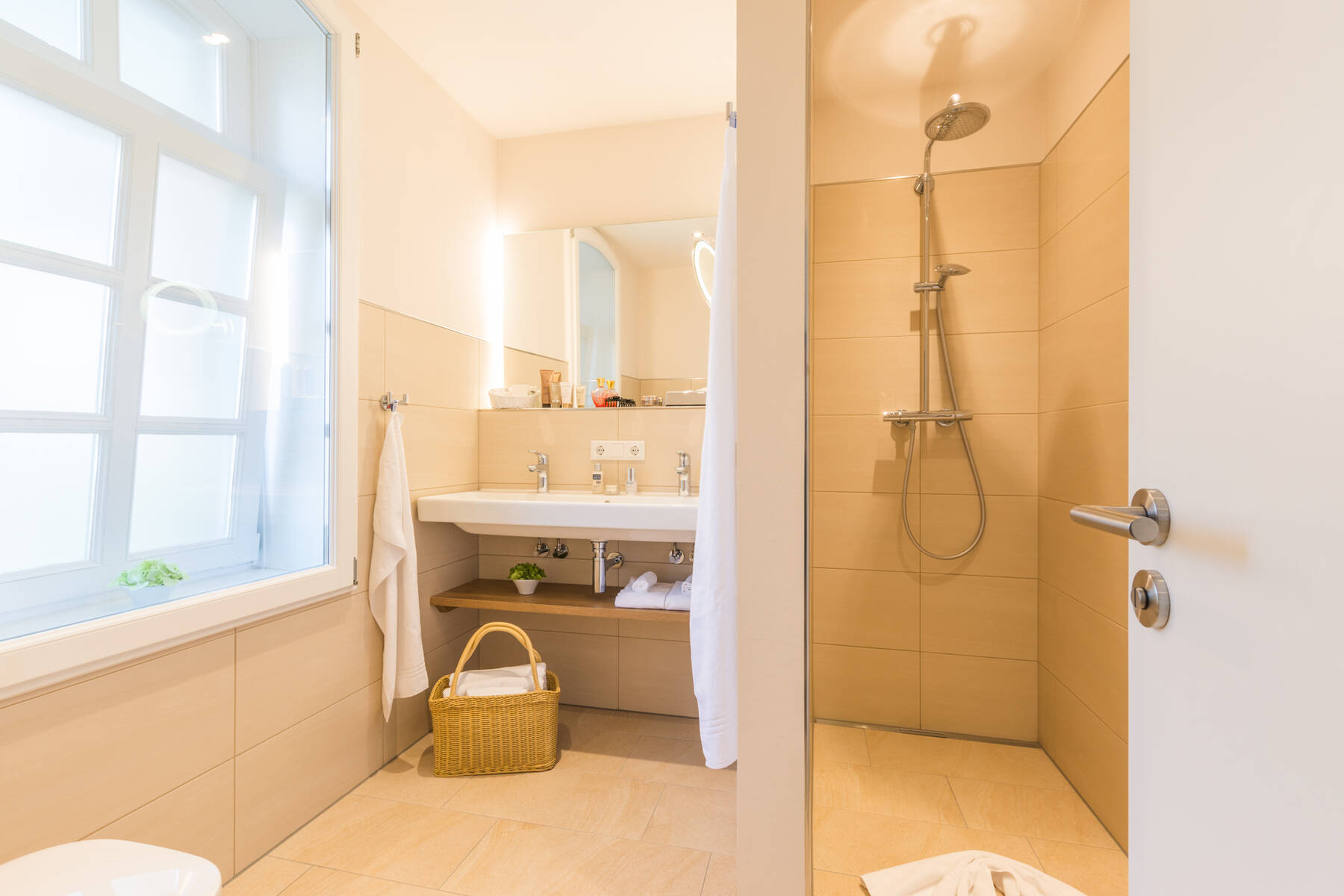 Wohnliches Komfort-Zimmer flora im Boutiquehotel Tides in Norden, Ostfriesland