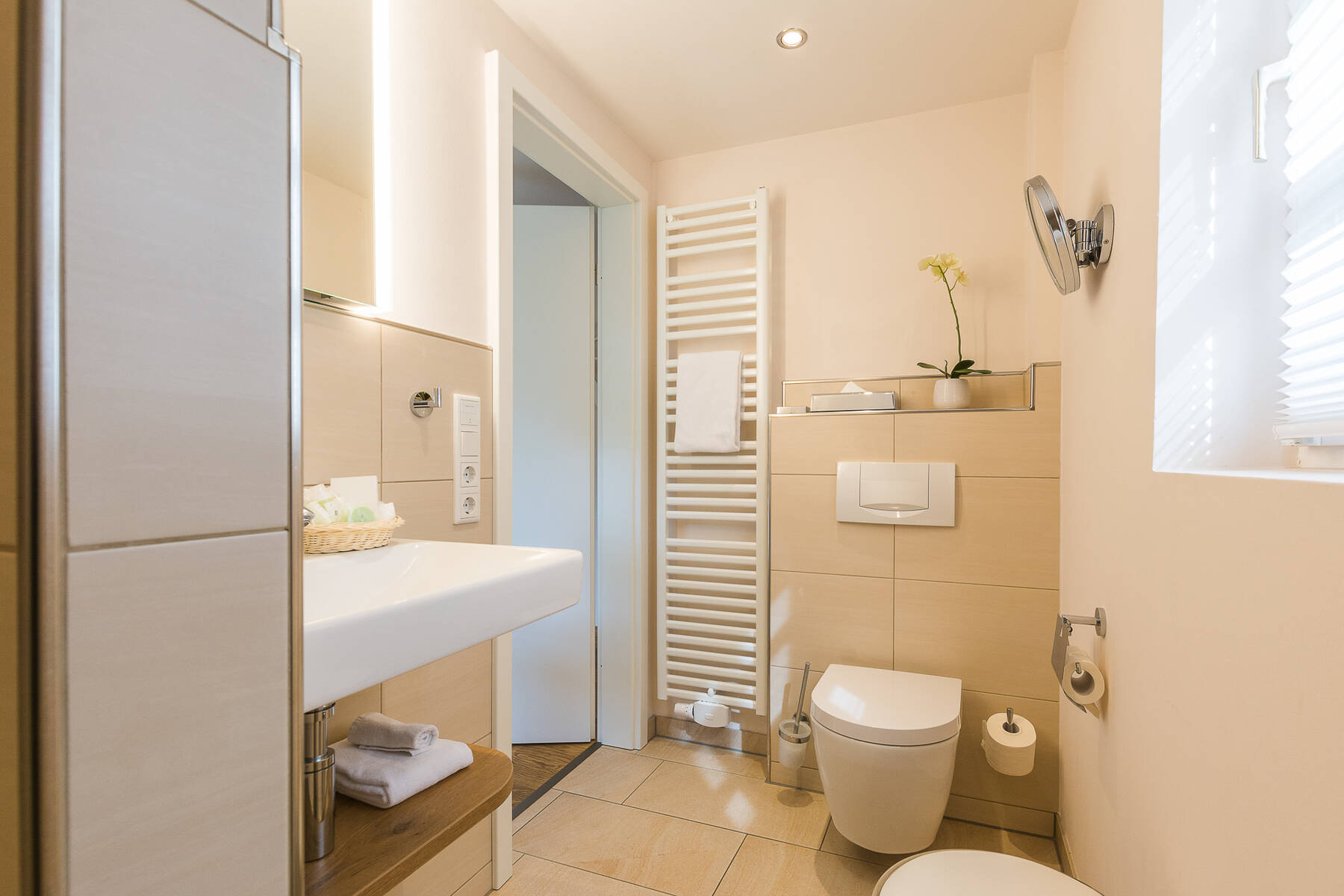 Economy-Einzelzimmer flora mit Einzelbett im Boutiquehotel Tides in Norden